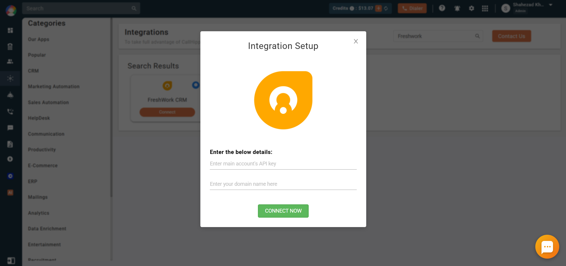 CallHippo Integration Setup popup with fields for the Freshworks API key and domain name