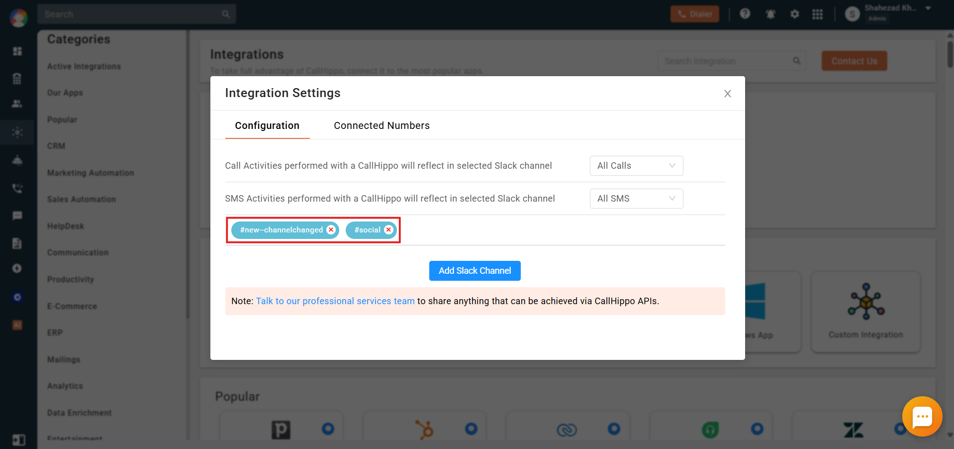 Slack Integration Settings showing two connected channels listed under the configuration tab