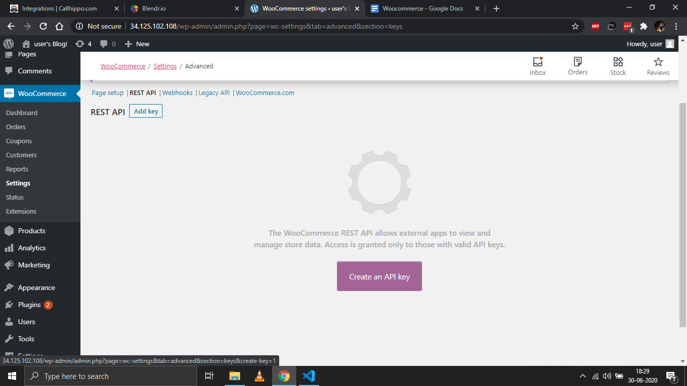 WooCommerce REST API page with Create an API key button